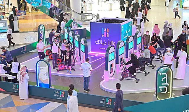 Al Nahdi's Ramadan event in a mall, with exercise bikes